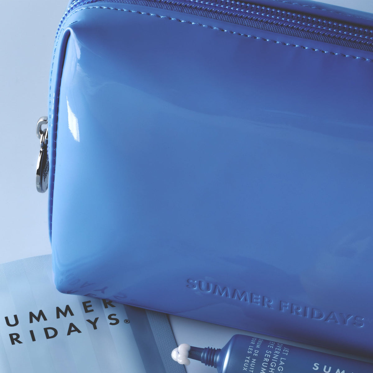 glossy-pouch-in-jet-lag-blue-l6 Glossy-Pouch-Jet-Lag.jpg